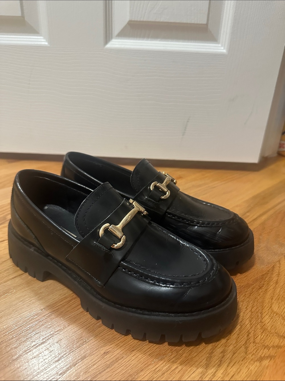 Steve Madden Black Leather Lug-Sole Loafers with Gold Bit